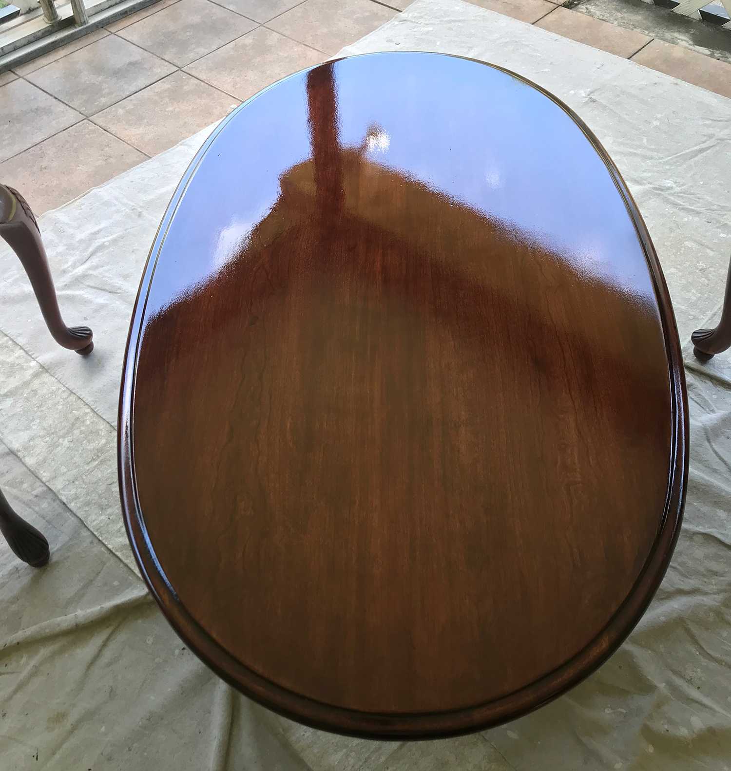 A Glossy high quality coffee table that has been restored to look brand new
